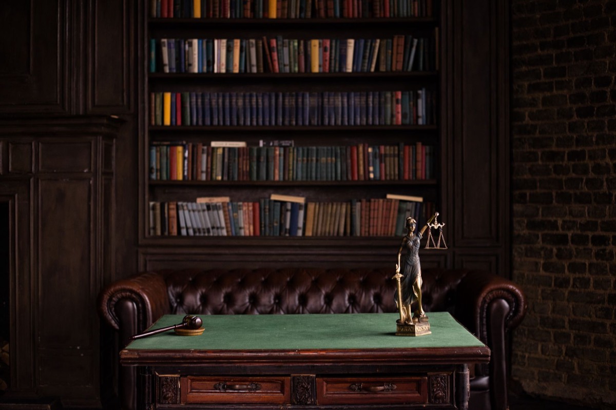 Lady Justice statue and gavel in a law office, federal tax lien withdrawal and lien release attorney in Texas
