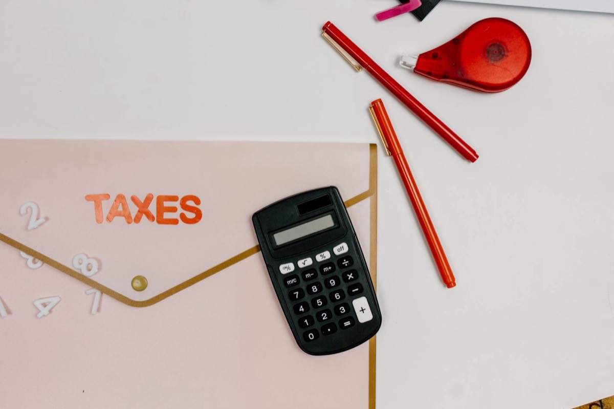 Tax folder and calculator, IRS first-time penalty abatement request to remove penalties and interest for Corpus Christi taxpayers